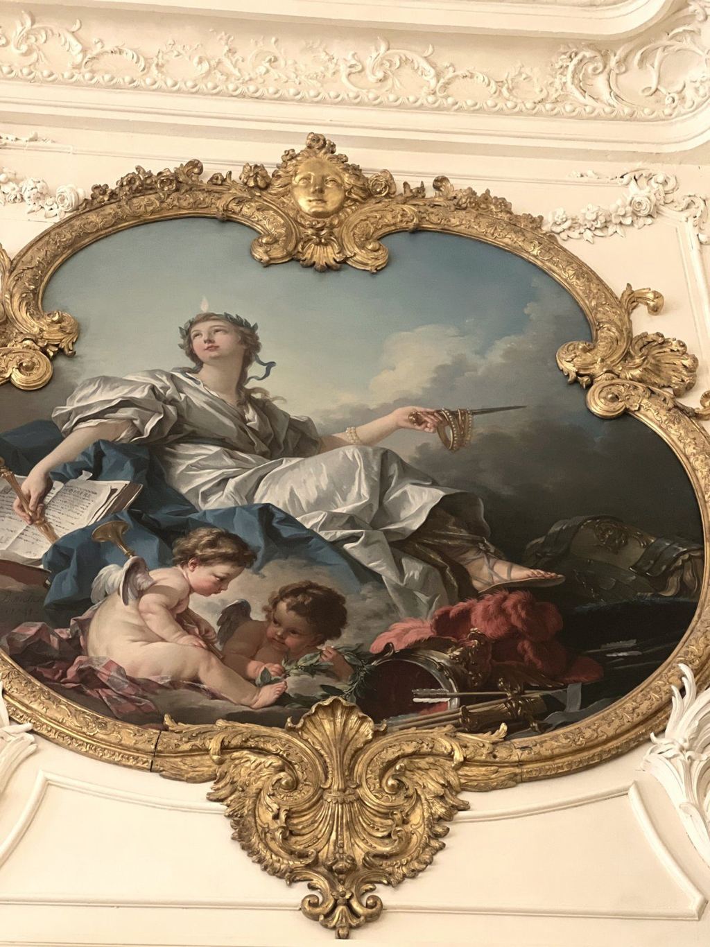 An ornate painted ceiling at the Musée Carnavalet in the Marais, Paris
